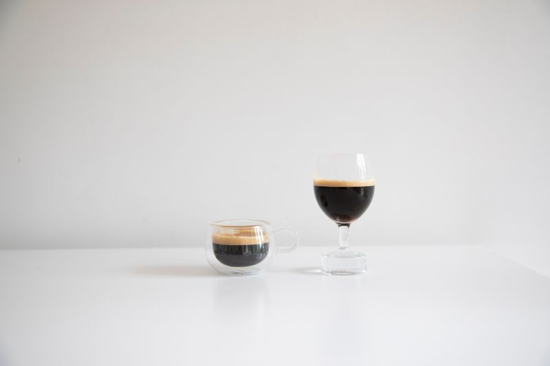 Espresso shot double Italian coffee in small cup